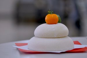 Kagamimochi - pounded rice cake with a mandarin orange on top