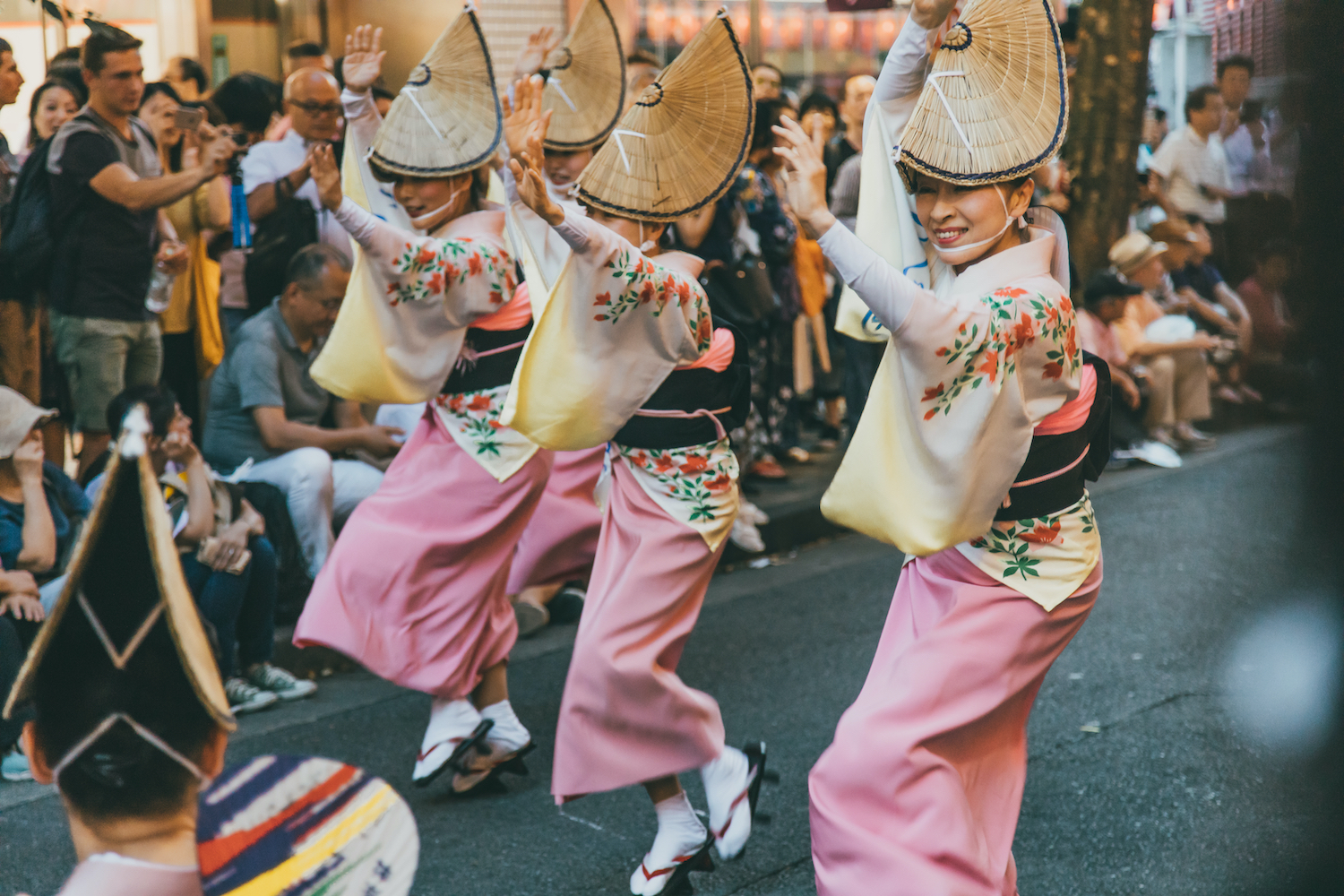 Tokyo, Japan - July 8, 2019: Awa-odori dance during the Kagurazaka Matsuri (summer festival). Participants form a procession to perform a graceful traditional Japanese dance that originated in Tokushima