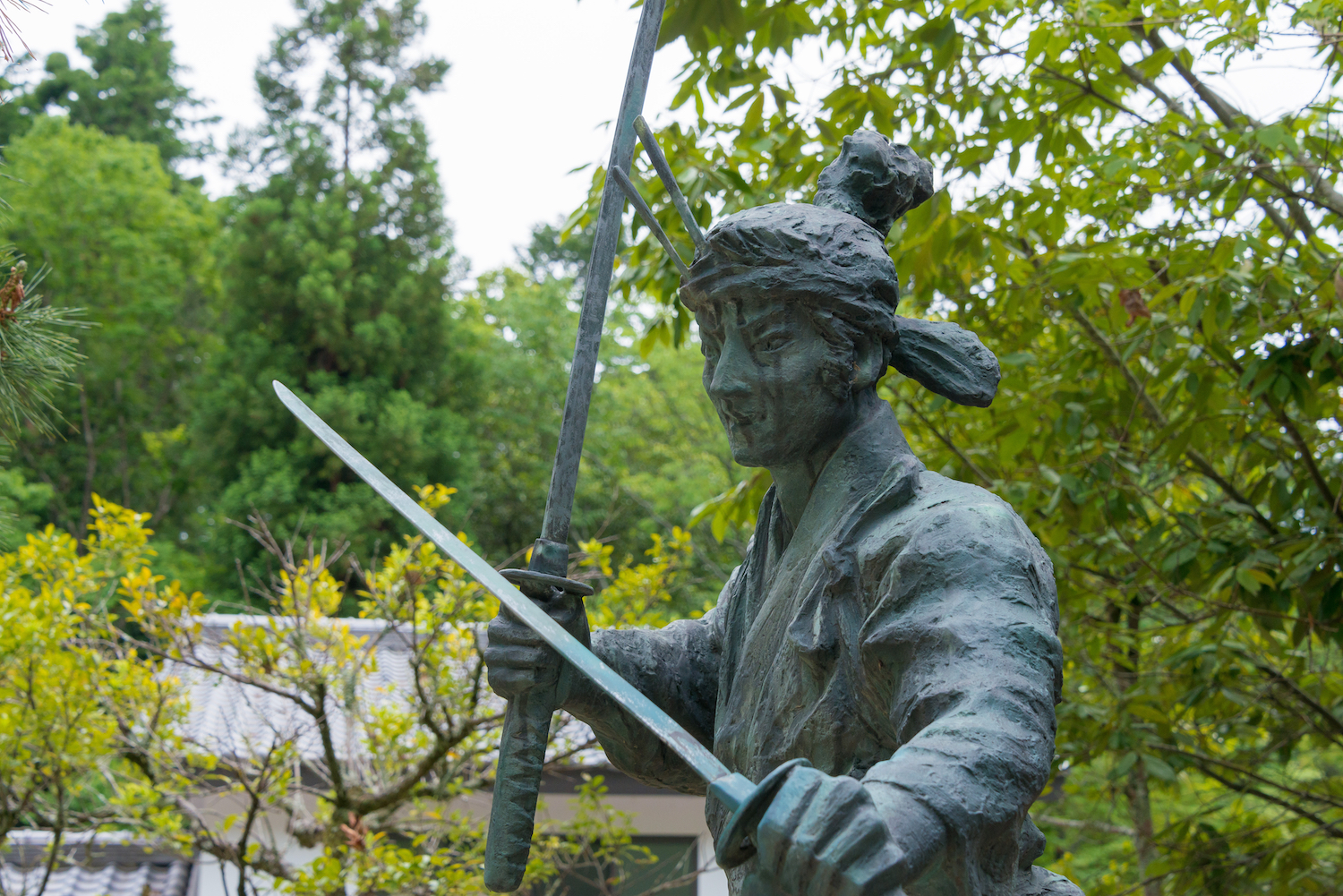 Kyoto, Japan - Mar 27 2019 - Miyamoto Musashi Statue at Hachidai-Jinja Shrine in Kyoto, Japan. Miyamoto Musashi (1584-1645) was a Japanese swordsman, philosopher, strategist, writer and ronin.