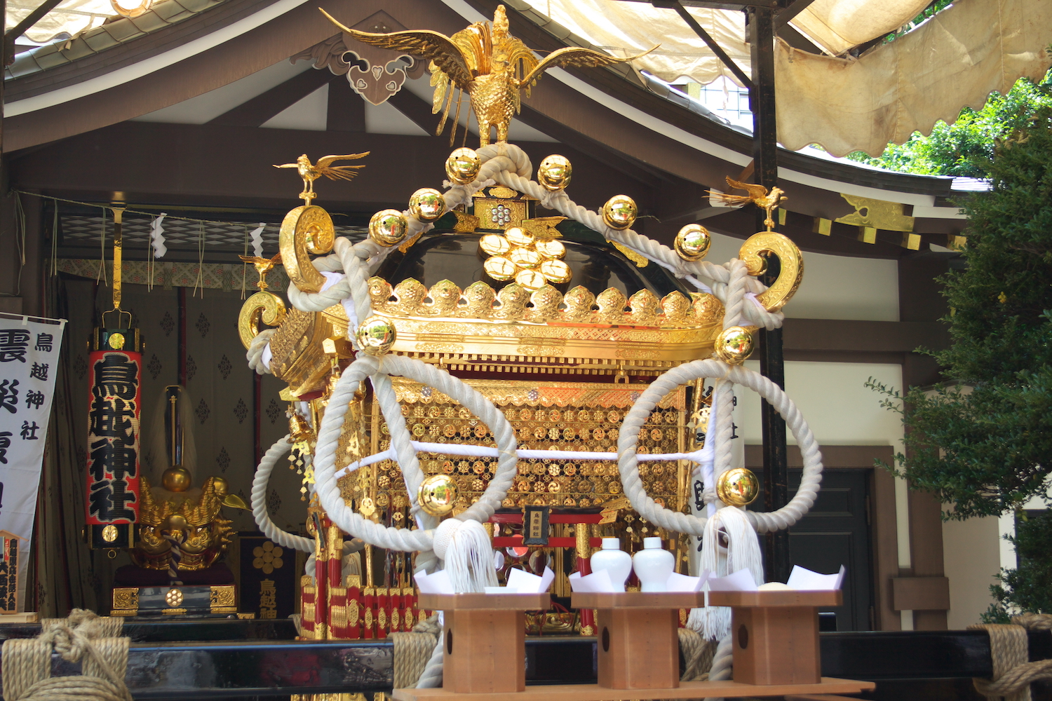 The portable shrine, mikoshi with phoenix on top