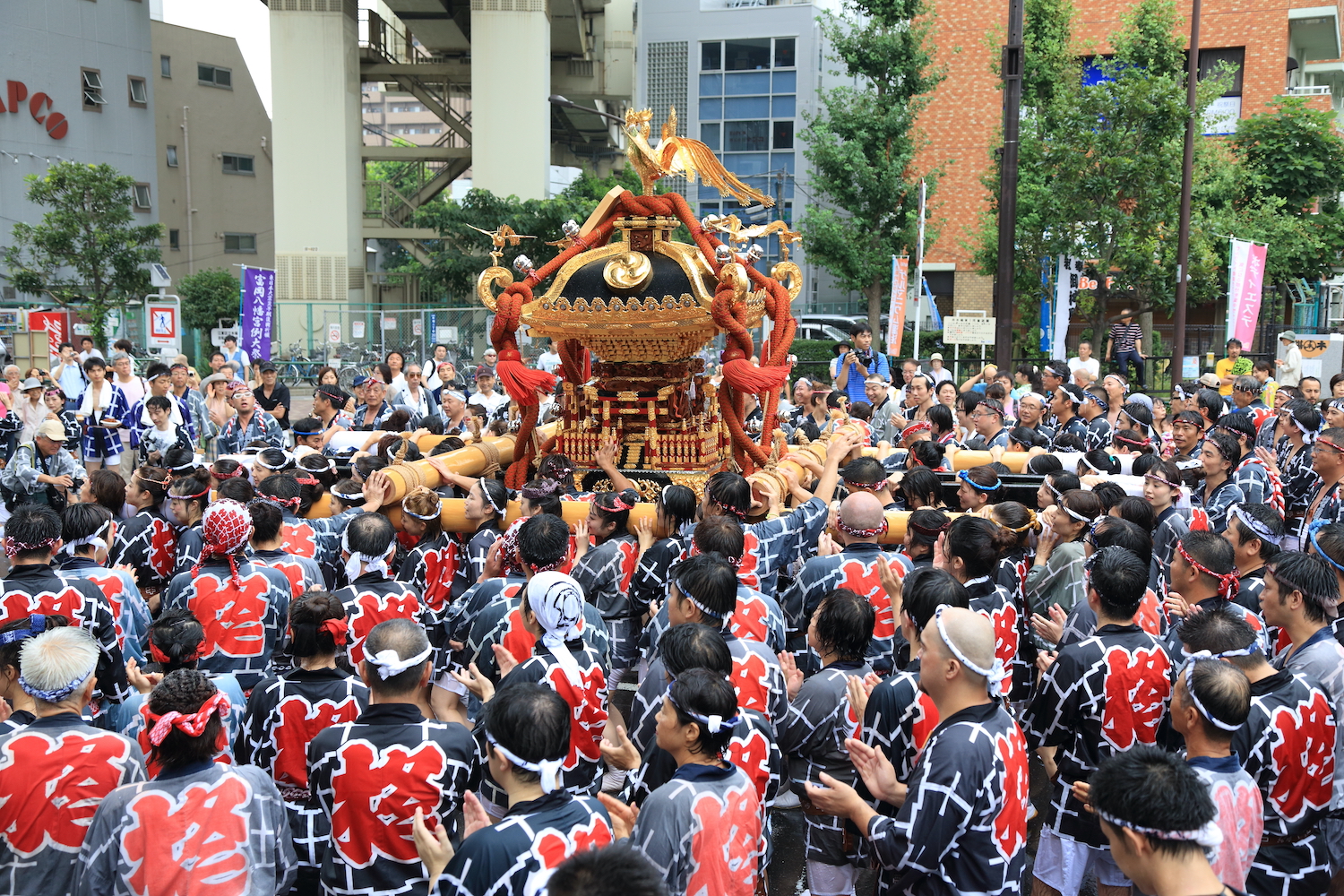 Tokyo, Japan - August 12, 2012 "Fukagawa Hachimangu Matsuri", held every three years in mid-August. More than 54 mikoshi parades and purifying water splashed on spectators by parade participants.