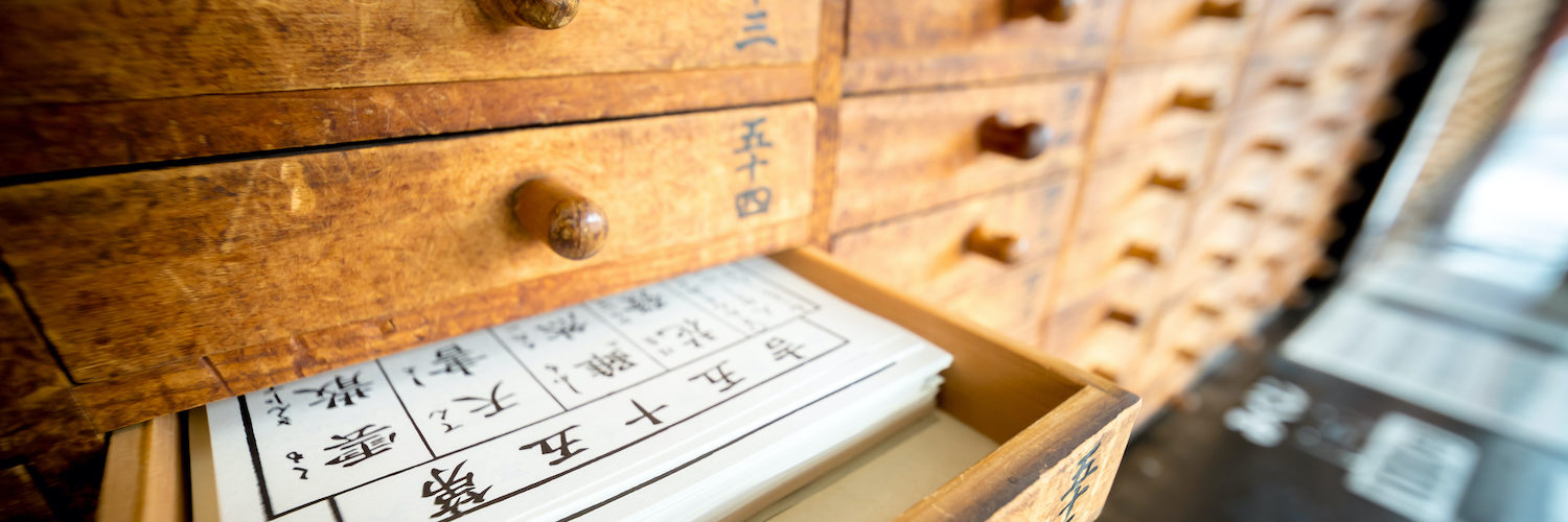 Tokyo, Japan - 15 March 2017: Omikuji (Paper Fortune) in a drawer at Senso ji. “Omikuji” is a strip of paper that predicts your fortune when you make a prayer to the gods and buddhas.