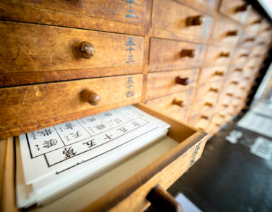 Tokyo, Japan - 15 March 2017: Omikuji (Paper Fortune) in a drawer at Senso ji. “Omikuji” is a strip of paper that predicts your fortune when you make a prayer to the gods and buddhas.