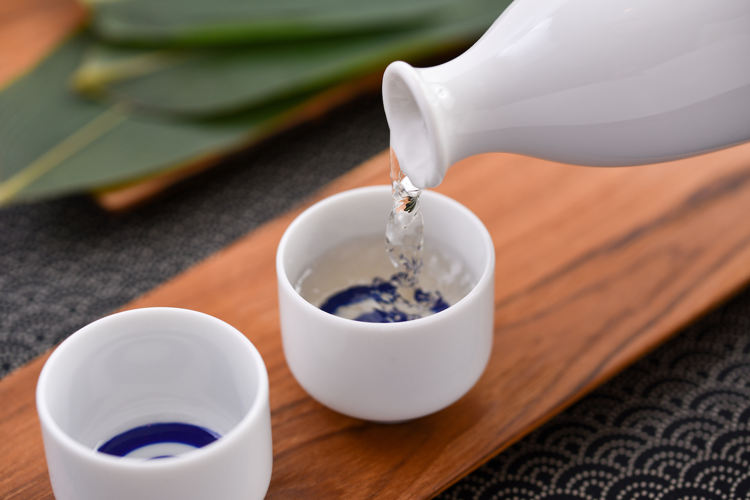 Sake pours from Tokkuri into Ochoco
