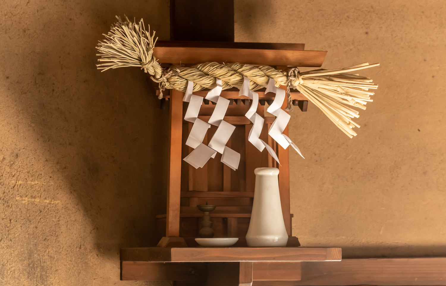 Simplified Kamidana. Kamidana is the miniature interior of a Japanese Shinto shrine. It is the object of faith.