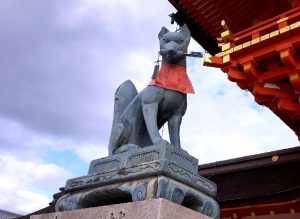 Guardian Fox with a Key in his Mouth at Fushimi Inari Shrine in Kyoto