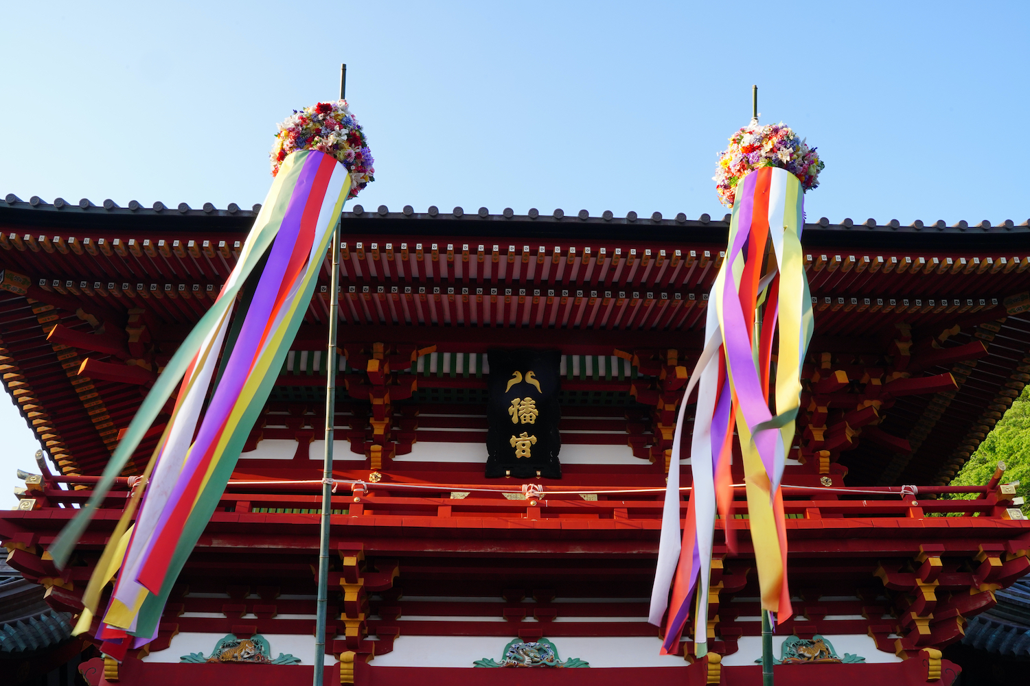 Japanese text is "Hachimangu" which is name of this shrine. Japanese shrine architecture with season decoration at Tsuruoka Hachimangu in Kamakura, Japan.