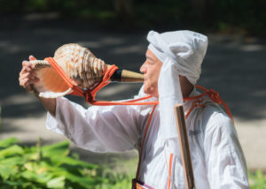 Iiyama, Nagano / JAPAN - SEPTEMBER 4th 2018: A Yamabushi (mountain priest) in front of the entrance of the 'God's Forest' in Kosuge.