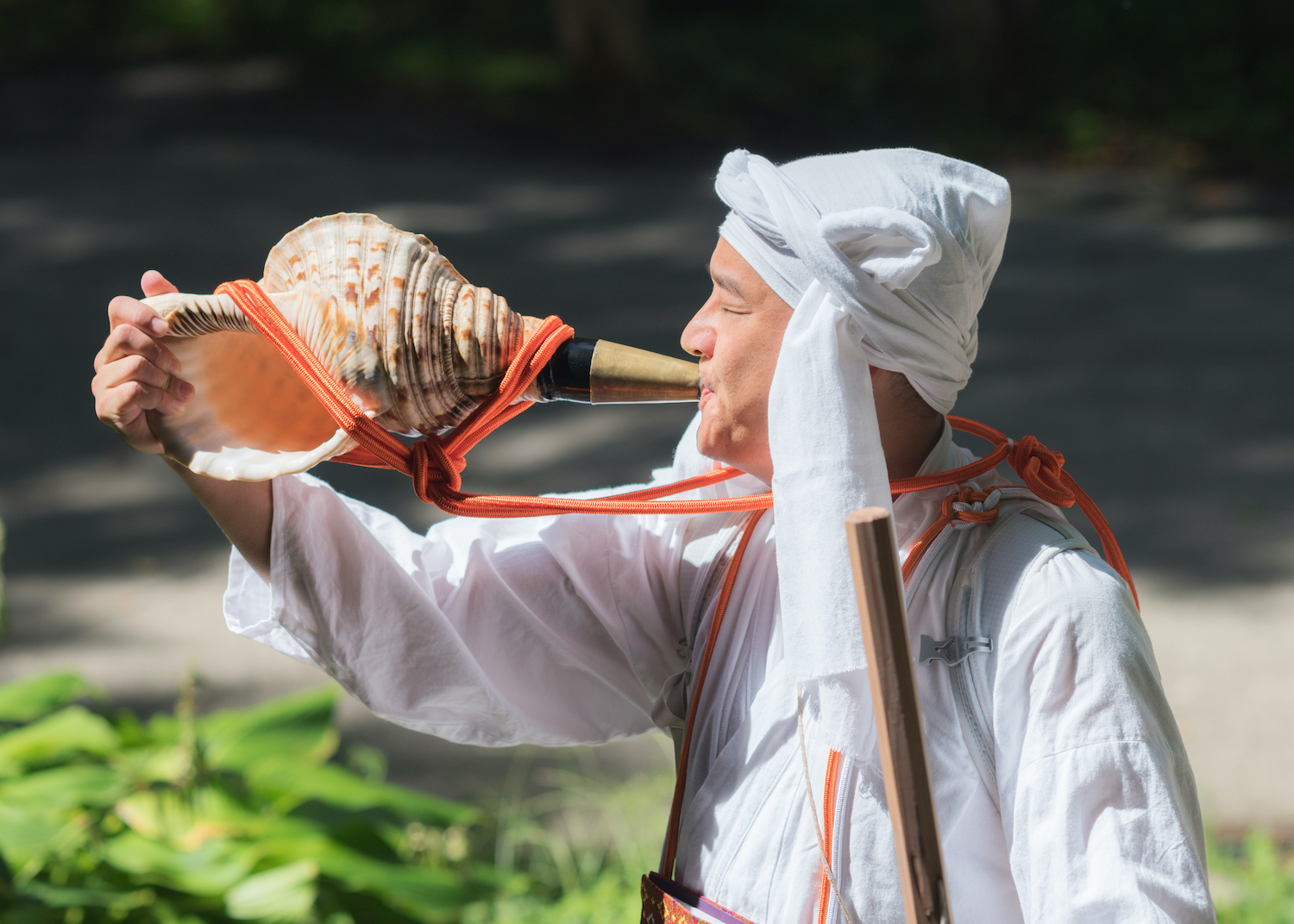 Iiyama, Nagano / JAPAN - SEPTEMBER 4th 2018: A Yamabushi (mountain priest)  in front of the entrance of the 'God's Forest' in Kosuge.