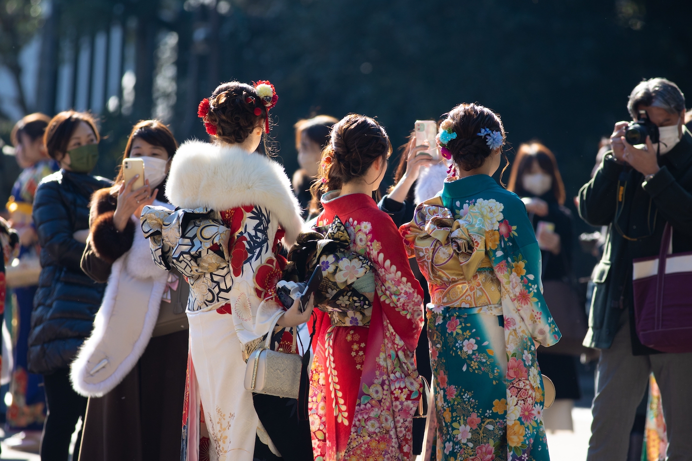 Young Japanese women wearing traditional kimonos for their coming of age day at the Meiji Jingu shrine in Tokyo, Japan.