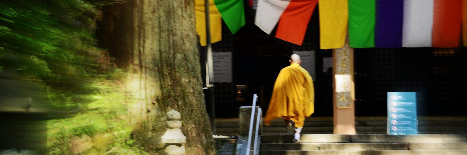 Japanese Buddhism, Buddhist monk at Mt. Koyasan stepping up to the temple