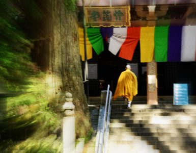 Japanese Buddhism, Buddhist monk at Mt. Koyasan stepping up to the temple