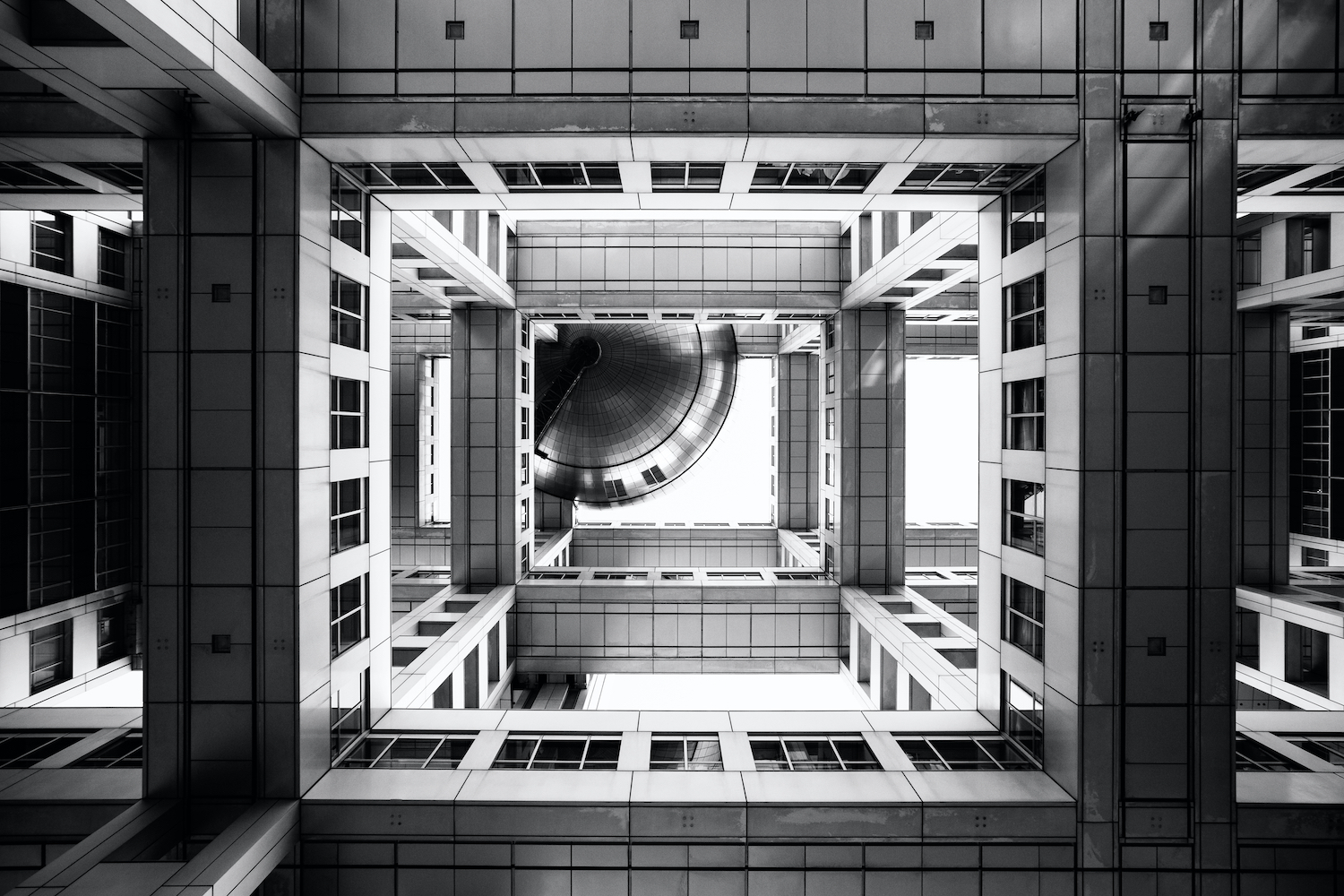 TOKYO, JAPAN - DECEMBER 5 2018: A bottom view of the Fuji Television headquarters on Odaiba Island, Japan. The Fuji Television Studios building was designed by the famous Kenzo Tange and is one of the most famous buildings in Japan.