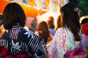 Girls in yukata at summer festival