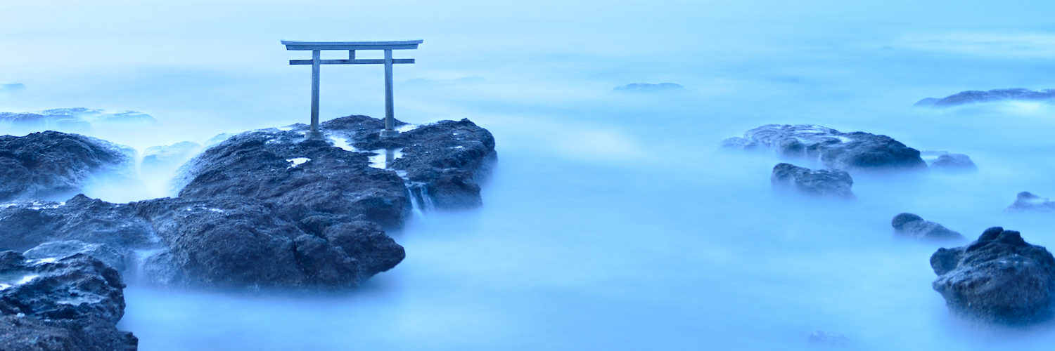 Torii - gateway of shrine in the sea in the early morning by long